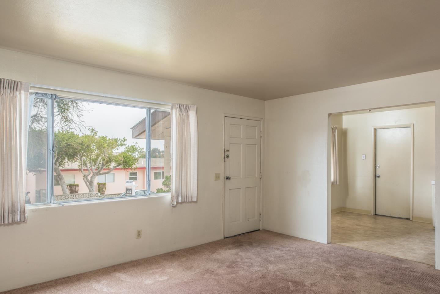 1816 Juarez Street Seaside, CA 93955 - Photo 7 of 27 an empty room with a window