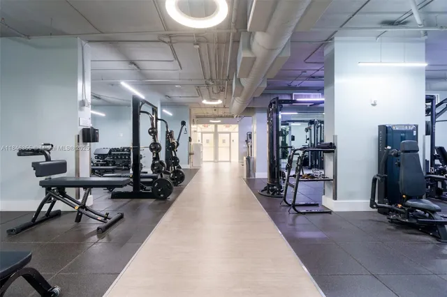 a view of a room with gym equipment