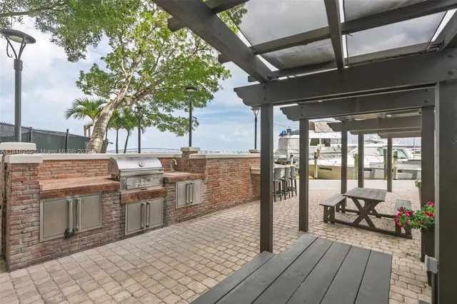 a view of a street with wooden fence