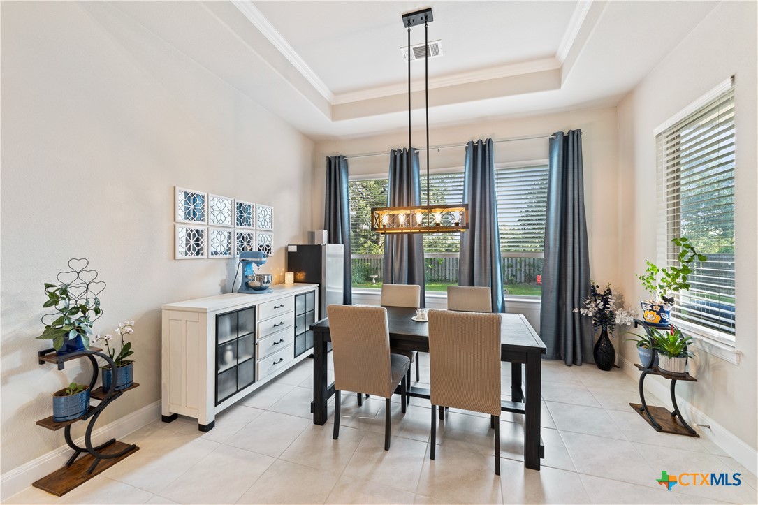 264 Axis Loop Georgetown, TX 78628 - Photo 15 of 33 a view of a livingroom with furniture window and wooden floor