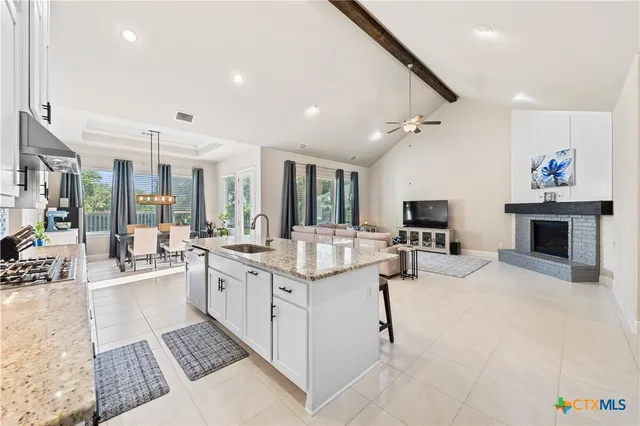 a front view of house with a garden