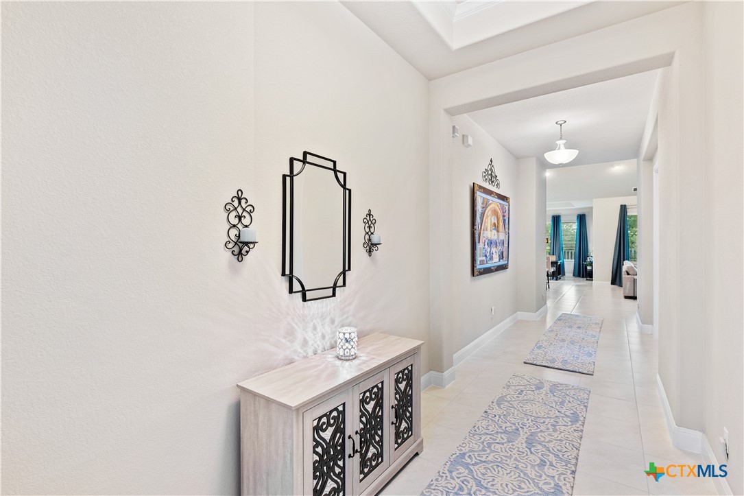 264 Axis Loop Georgetown, TX 78628 - Photo 6 of 33 a bathroom with a sink and a mirror