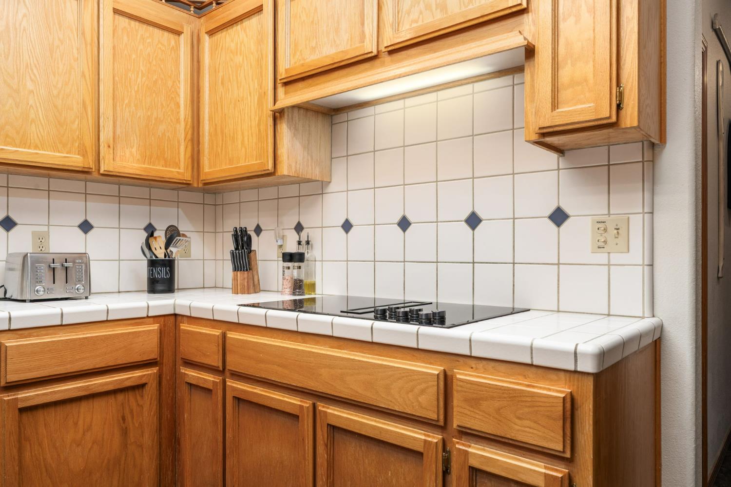 41811 Gray Rock Road Shaver Lake, CA 93664 - Photo 18 of 33 a kitchen with a sink and cabinets