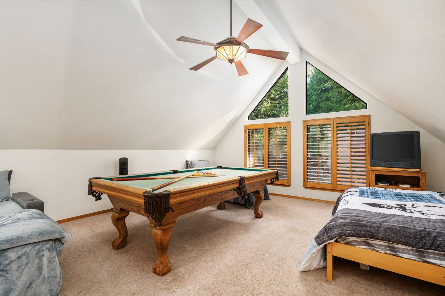 41811 Gray Rock Road Shaver Lake, CA 93664 - Photo 23 of 33 a bedroom with furniture and a window