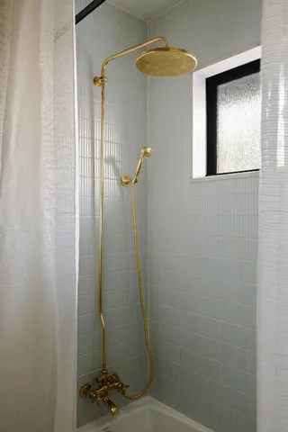 a bathroom with a mirror