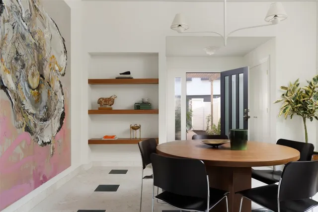 a view of a workspace with furniture