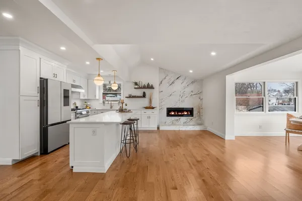 a bathroom with a shower and a sink