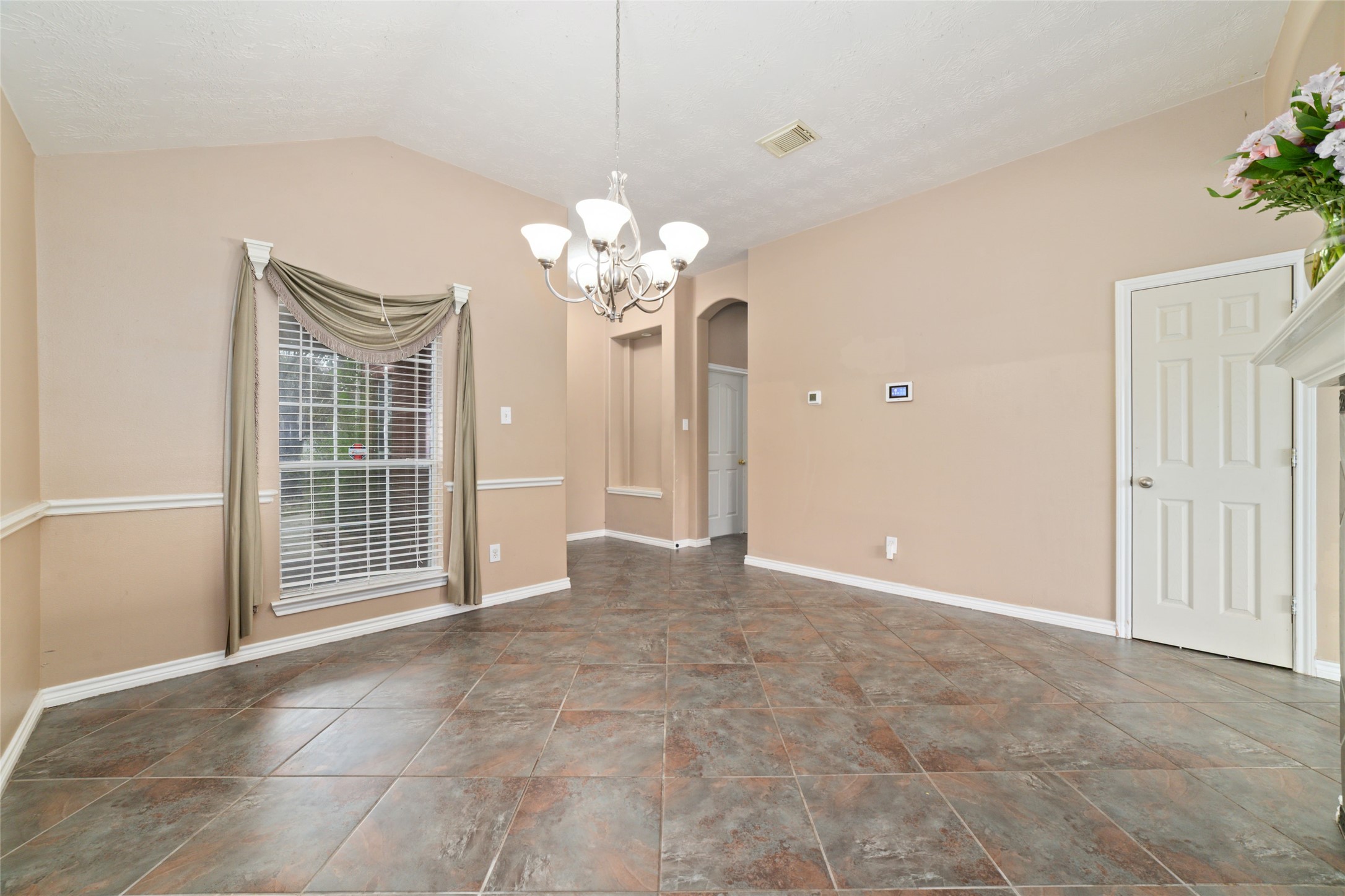 22911 Sebastian Drive Porter, TX 77365 - Photo 5 of 23 a view of a livingroom with a chandelier