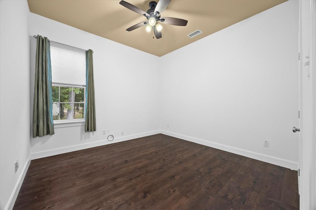 2526 Fox Point Circle Quinlan, TX 75474 - Photo 27 of 35 Spacious auxiliary bedroom