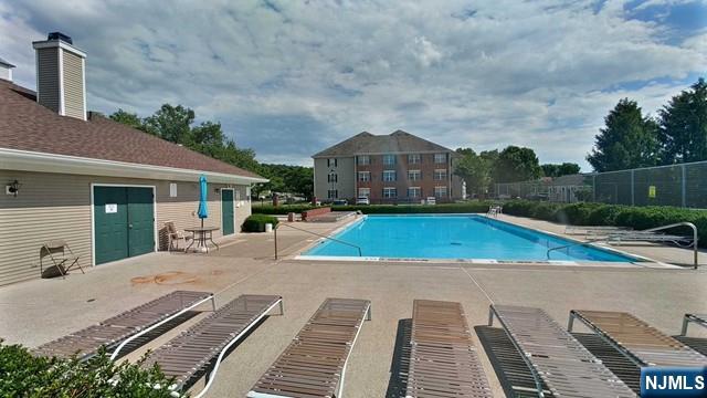 1052 Chedworth Circle Mahwah, NJ 07430 - Photo 14 of 16 a view of a house with pool
