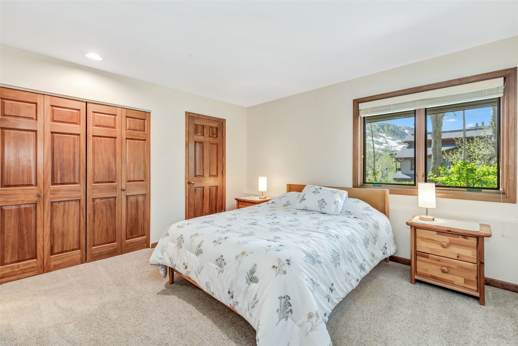 1675 Ranch Road, Unit 411 Steamboat Springs, CO 80487 - Photo 23 of 48 Primary bedroom featuring light colored carpet
