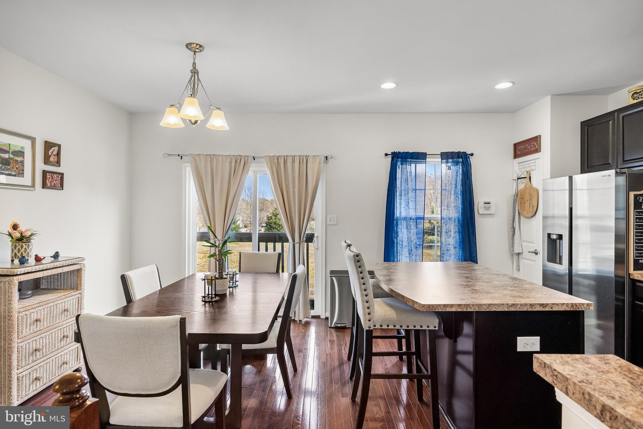 1202 Emerson Court Clementon, NJ 08021 - Photo 13 of 36 a view of a dining room with furniture