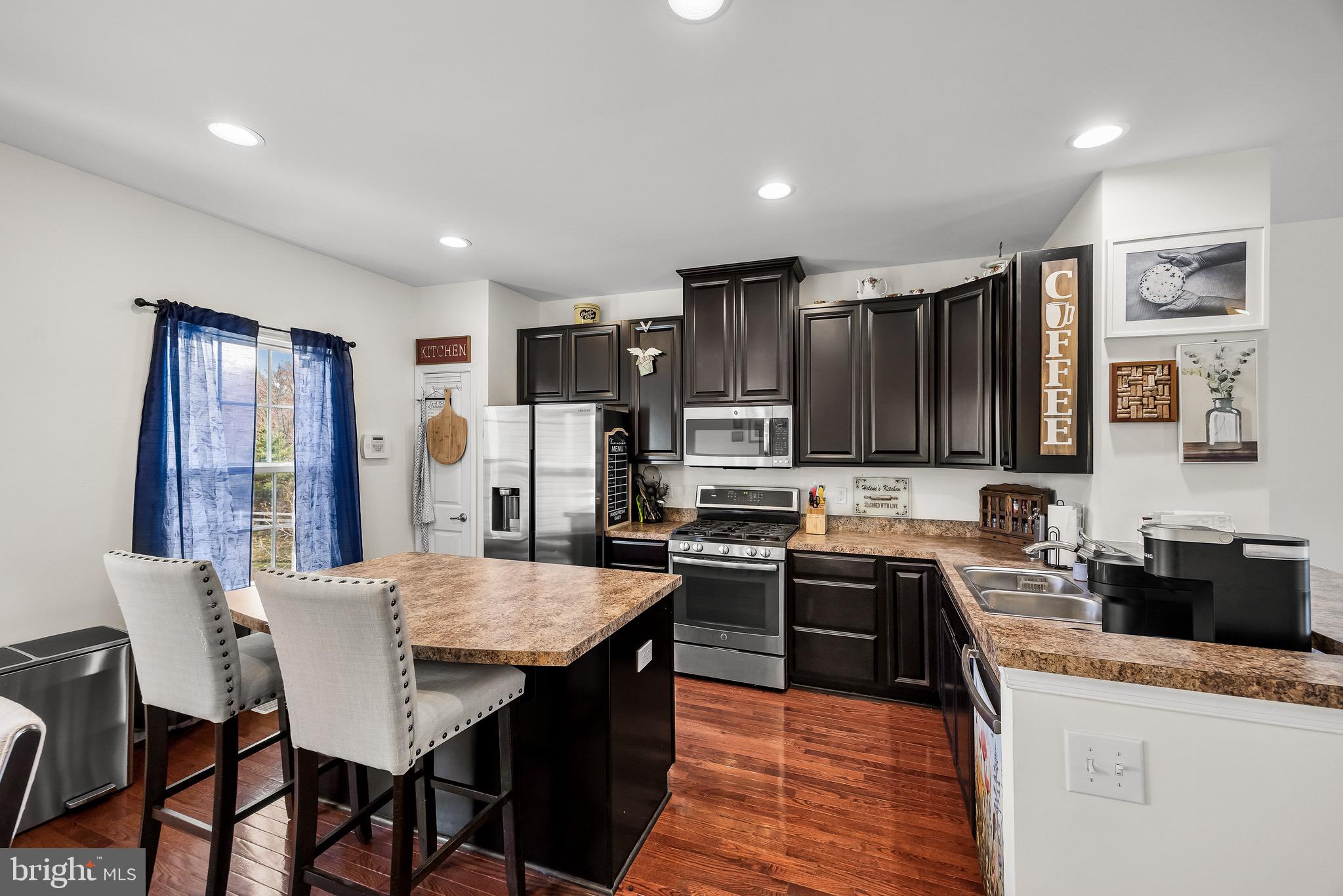 1202 Emerson Court Clementon, NJ 08021 - Photo 15 of 36 a kitchen with granite countertop a sink and appliances