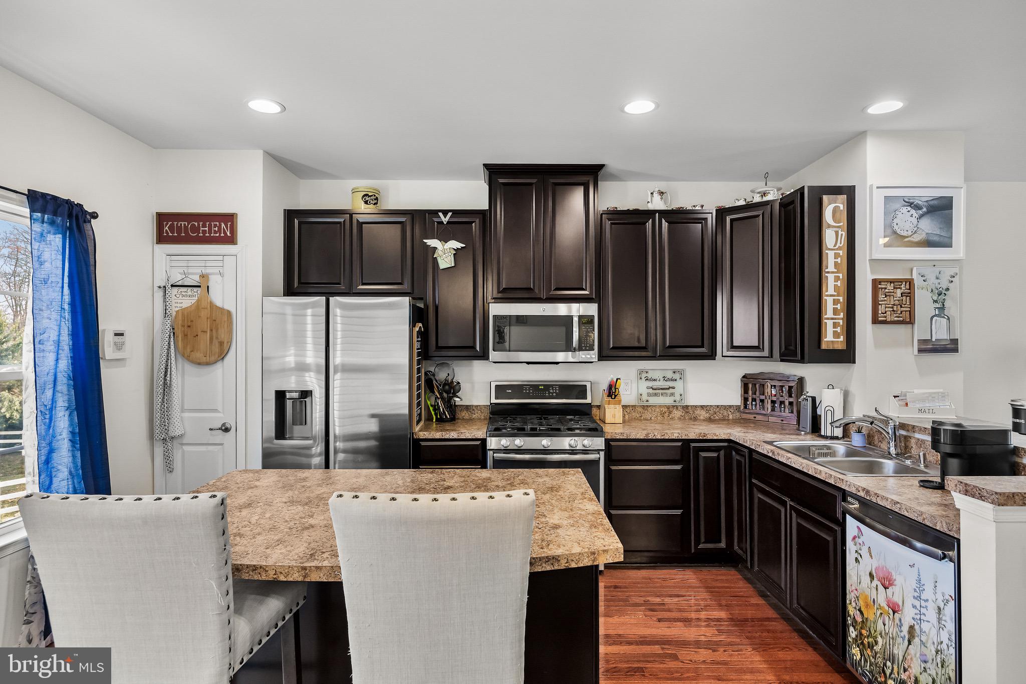 1202 Emerson Court Clementon, NJ 08021 - Photo 16 of 36 a kitchen with a sink cabinets and refrigerator