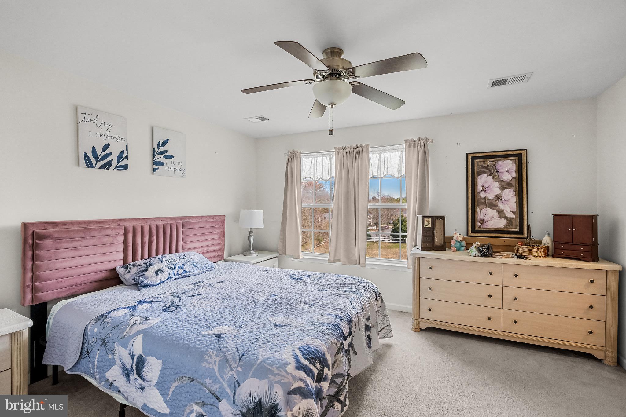 1202 Emerson Court Clementon, NJ 08021 - Photo 19 of 36 a bedroom with a bed a window and a dresser