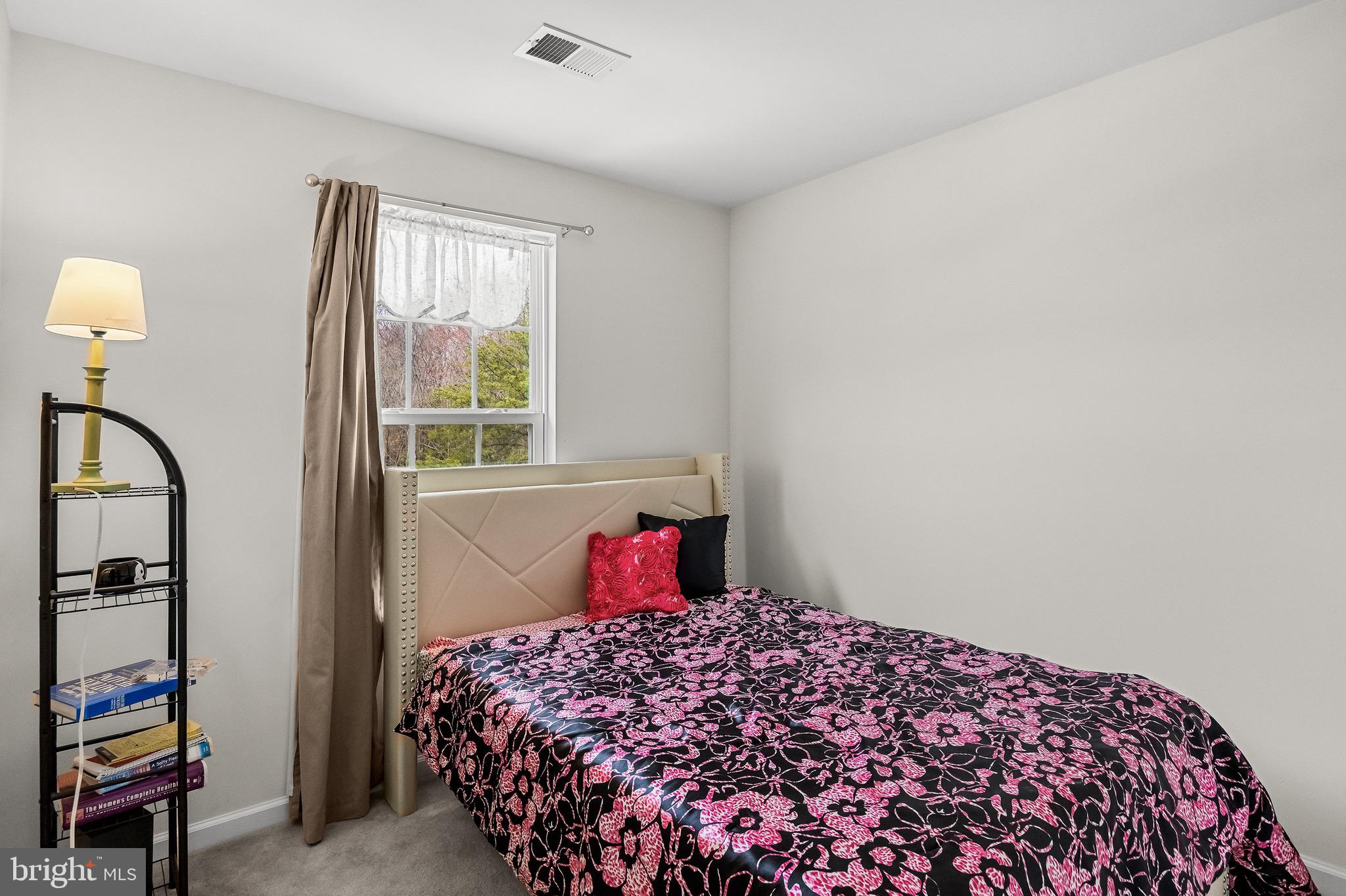 1202 Emerson Court Clementon, NJ 08021 - Photo 23 of 36 a bedroom with a bed and a window