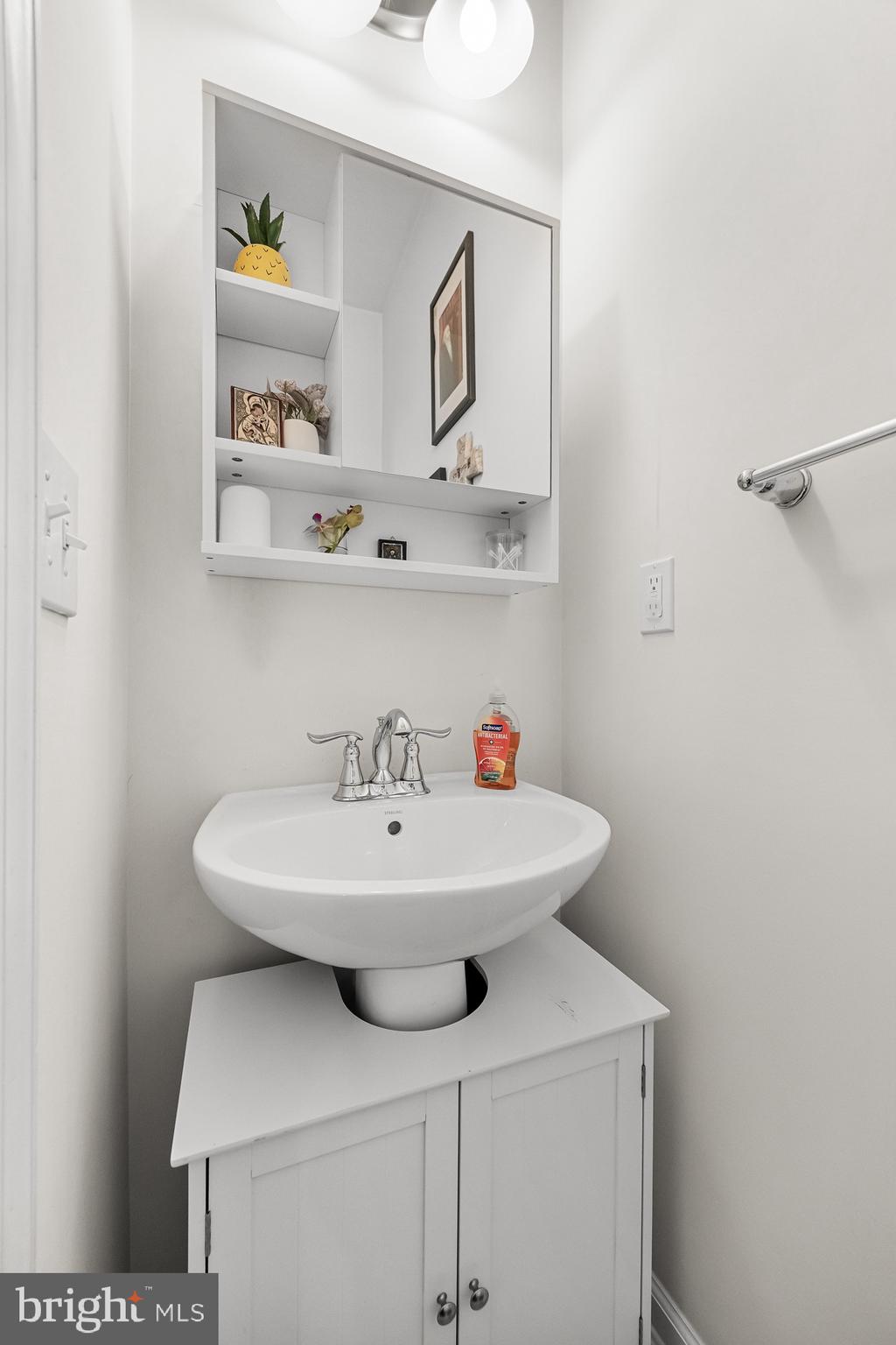 1202 Emerson Court Clementon, NJ 08021 - Photo 27 of 36 a bathroom with a sink and a toilet