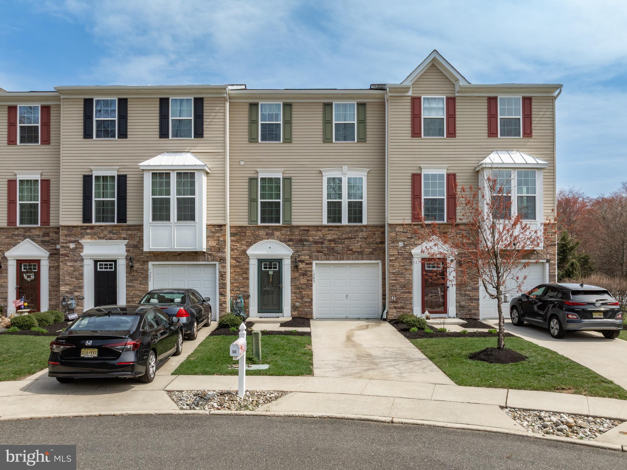 1202 Emerson Court Clementon, NJ 08021 - Photo 30 of 36 a car parked in front of a house