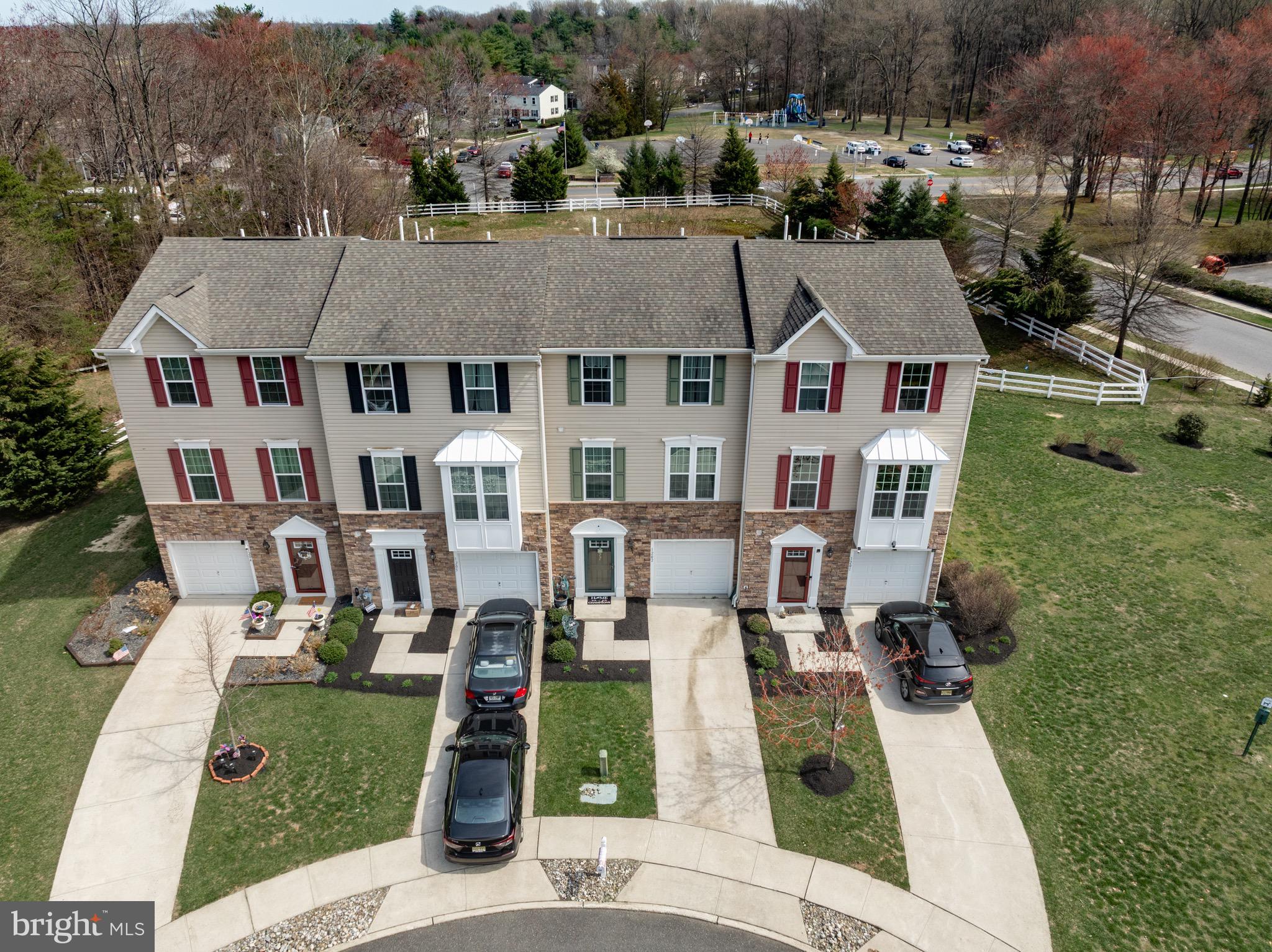 1202 Emerson Court Clementon, NJ 08021 - Photo 4 of 36 an aerial view of a house with a garden