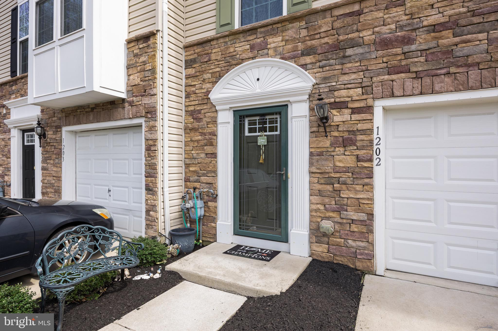 1202 Emerson Court Clementon, NJ 08021 - Photo 6 of 36 a front view of a house with parking