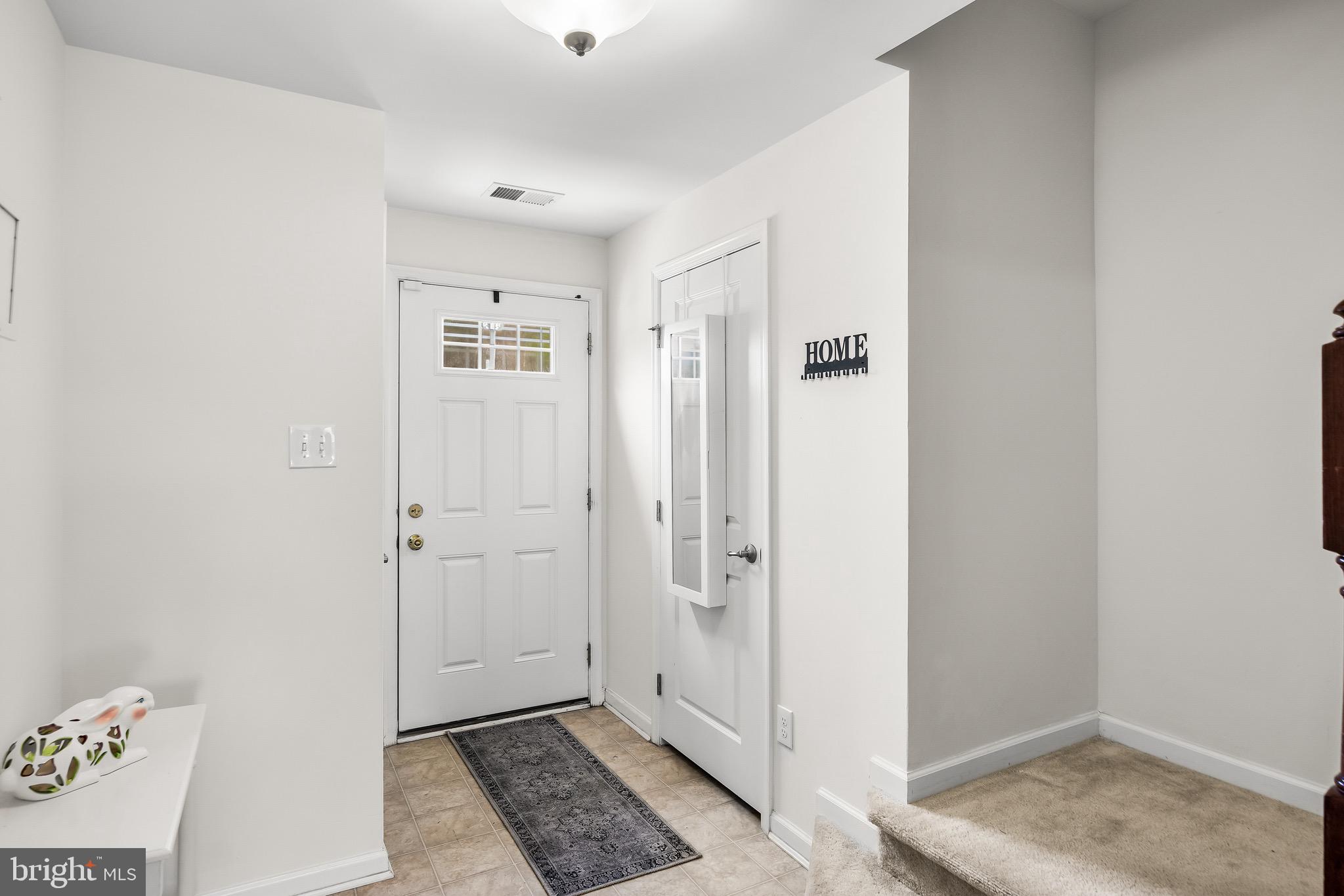1202 Emerson Court Clementon, NJ 08021 - Photo 9 of 36 a view of a hallway with closet and bathroom