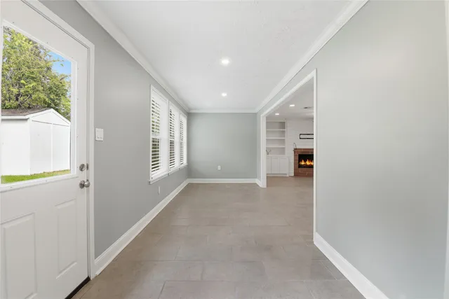 a view of empty room with a window