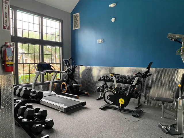 a view of a room with gym equipment