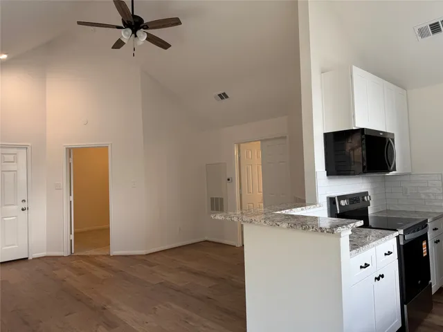 a view of workspace with flat screen tv