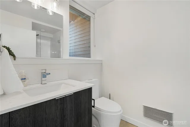 a bathroom with a sink and a toilet