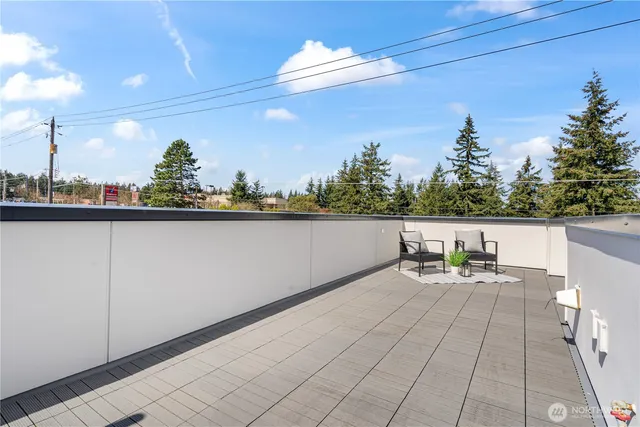 a terrace view with sitting space and garden view