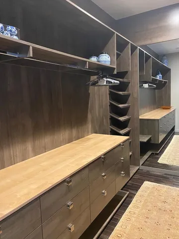 a bathroom with a bathtub and shower