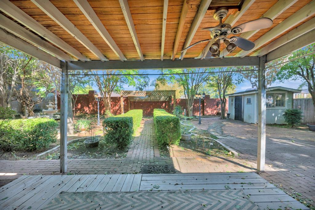 3409 Crescent Court Bedford, TX 76021 - Photo 31 of 40 a view of a porch with garden