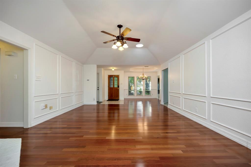3409 Crescent Court Bedford, TX 76021 - Photo 7 of 40 a view of empty room with wooden floor