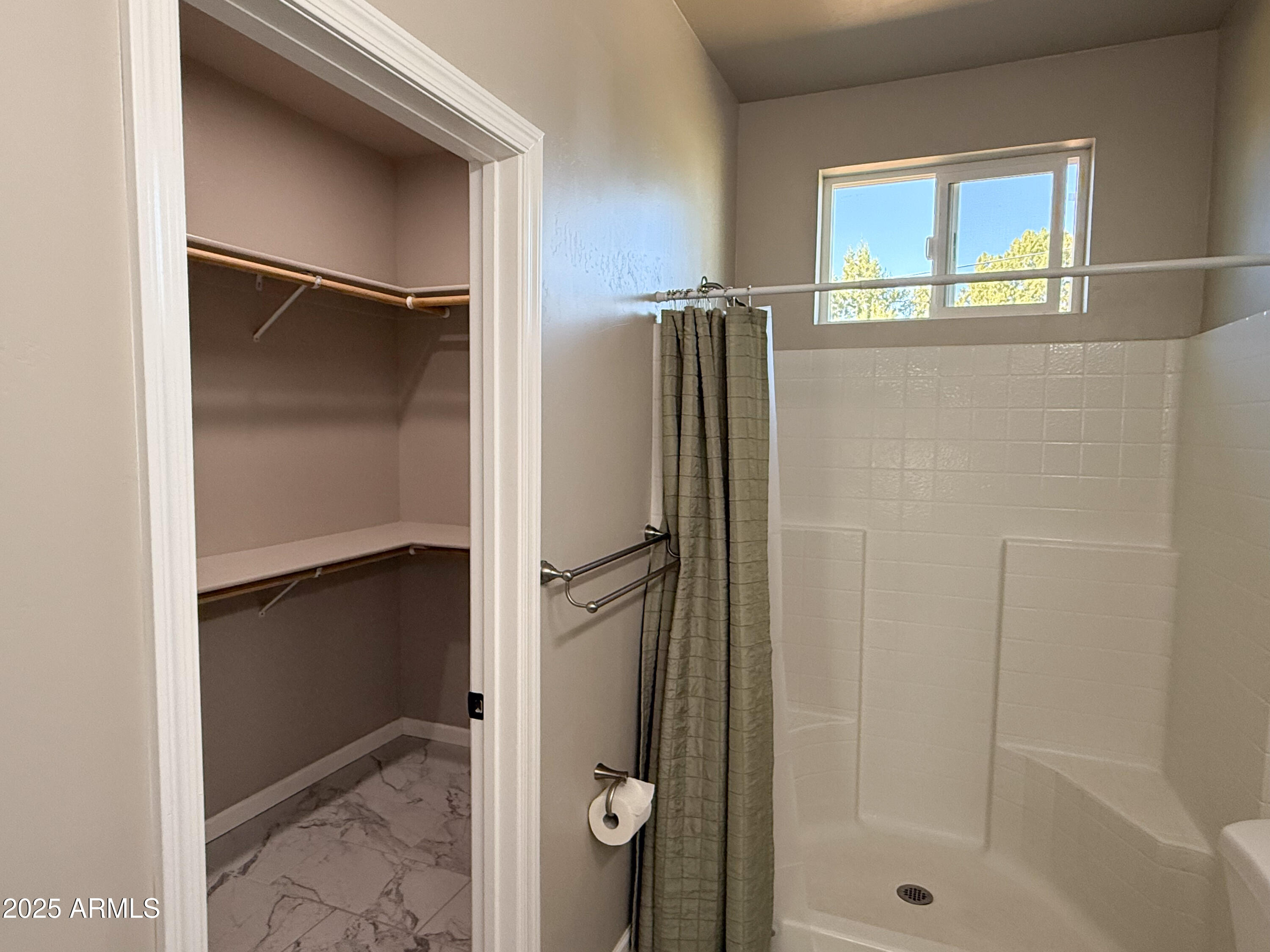 4850 East Oswego Street Rimrock, AZ 86335 - Photo 13 of 21 a bathroom with a glass shower door and a sink