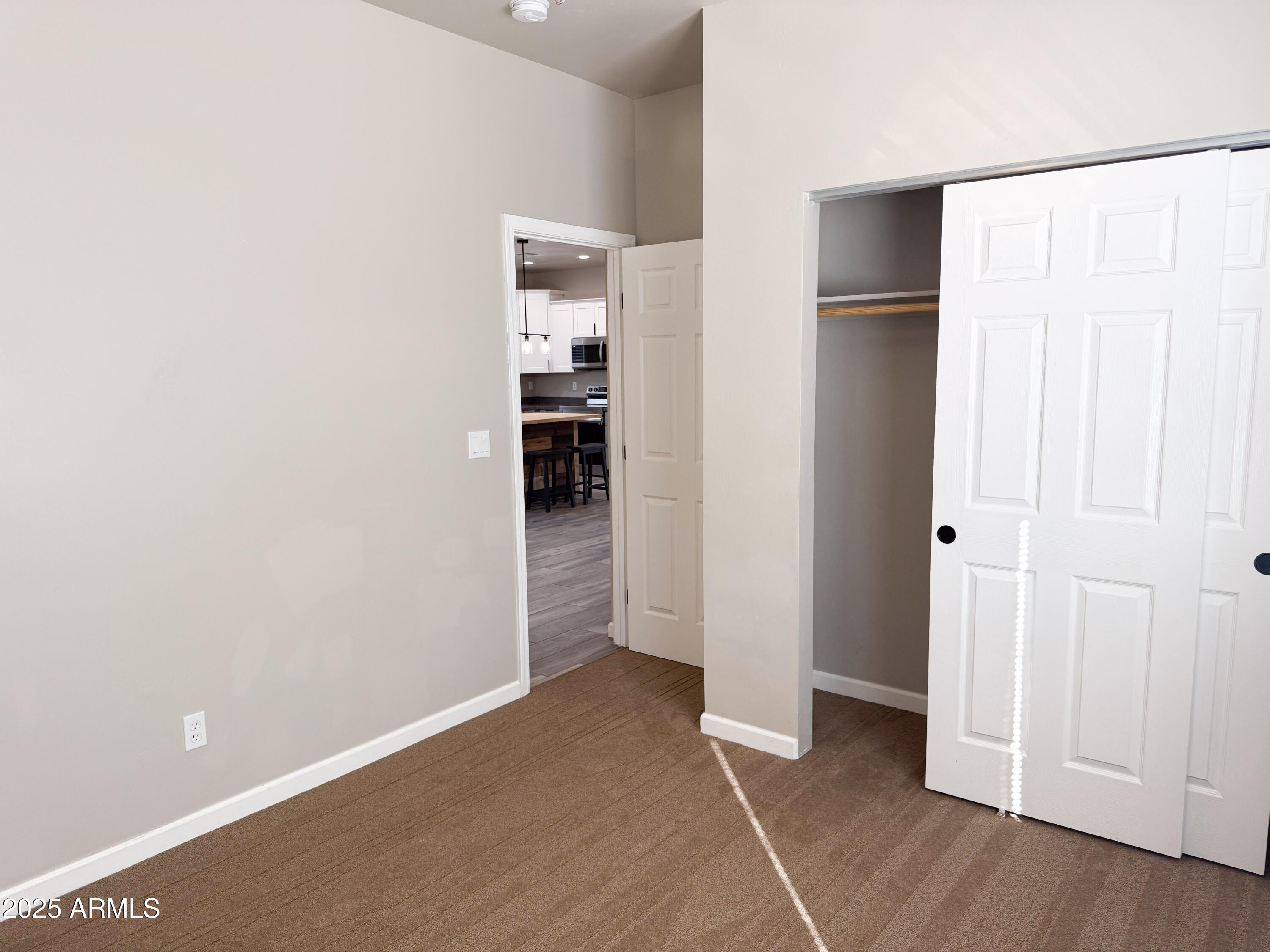4850 East Oswego Street Rimrock, AZ 86335 - Photo 14 of 21 a view of empty room with wooden floor