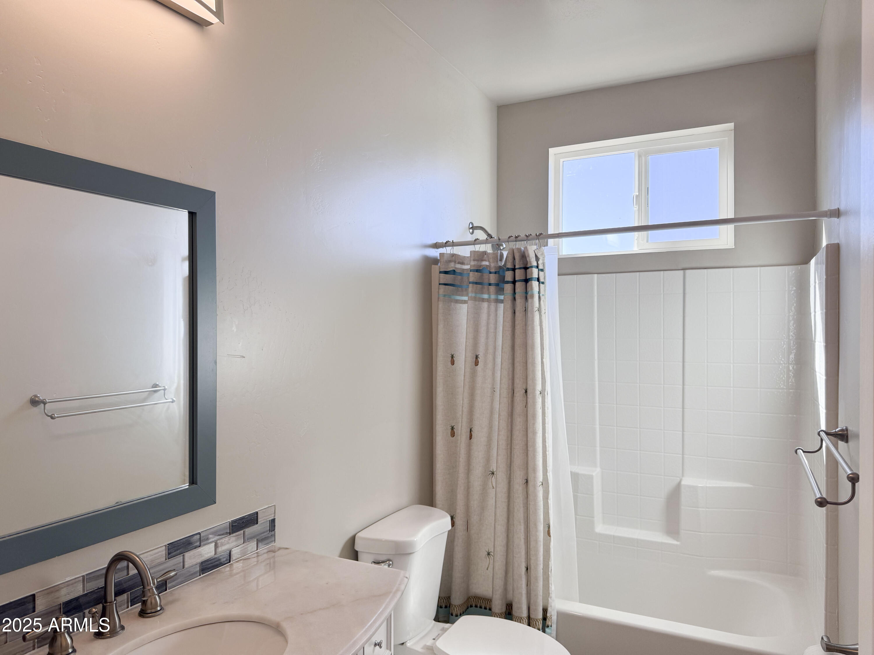 4850 East Oswego Street Rimrock, AZ 86335 - Photo 17 of 21 a bathroom with a sink mirror vanity and toilet
