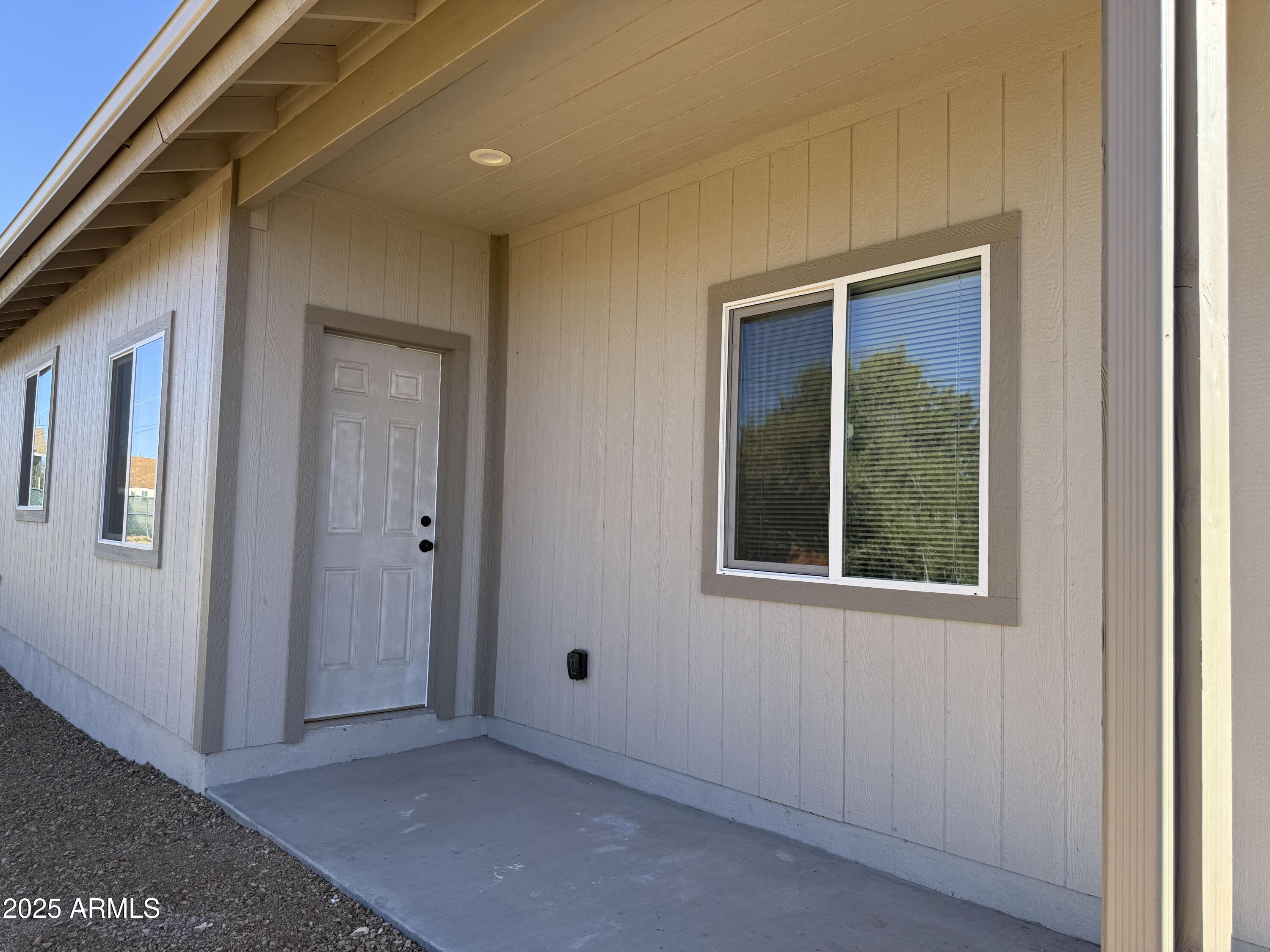 4850 East Oswego Street Rimrock, AZ 86335 - Photo 18 of 21 a view of an empty room with a window