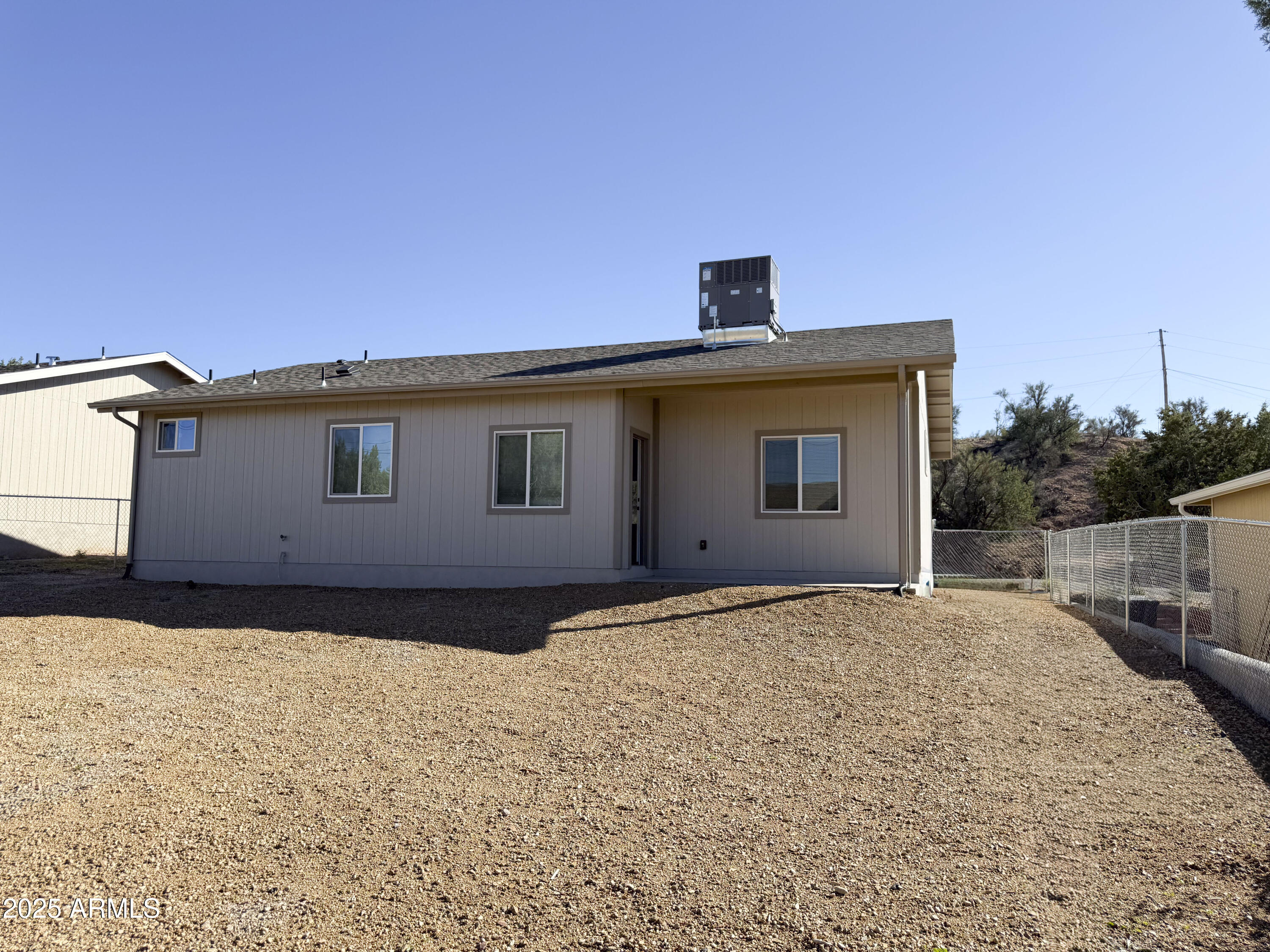 4850 East Oswego Street Rimrock, AZ 86335 - Photo 19 of 21 a front view of a house with a yard
