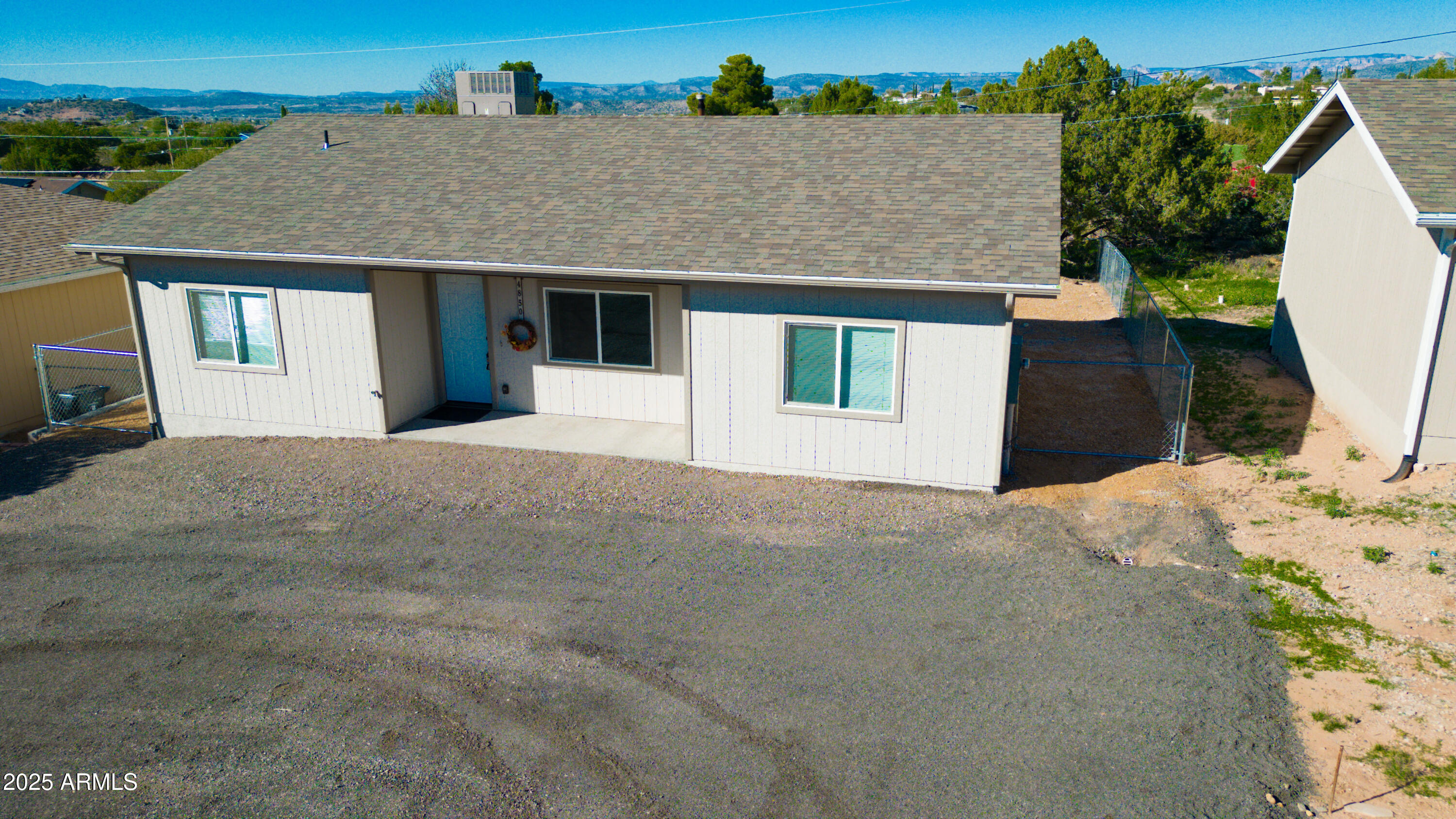 4850 East Oswego Street Rimrock, AZ 86335 - Photo 21 of 21 a front view of a house with a yard