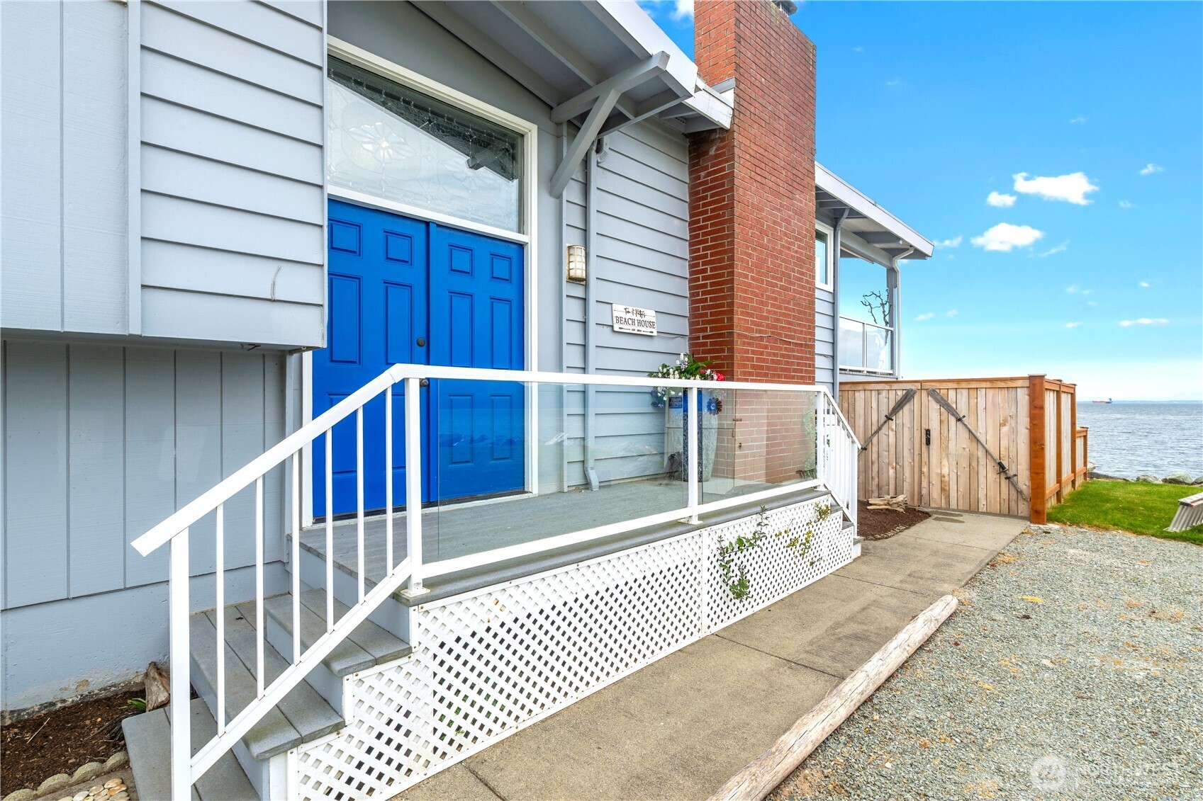 9609 Samish Island Road Bow, WA 98232 - Photo 33 of 33 a view of a balcony with wooden floor and fence