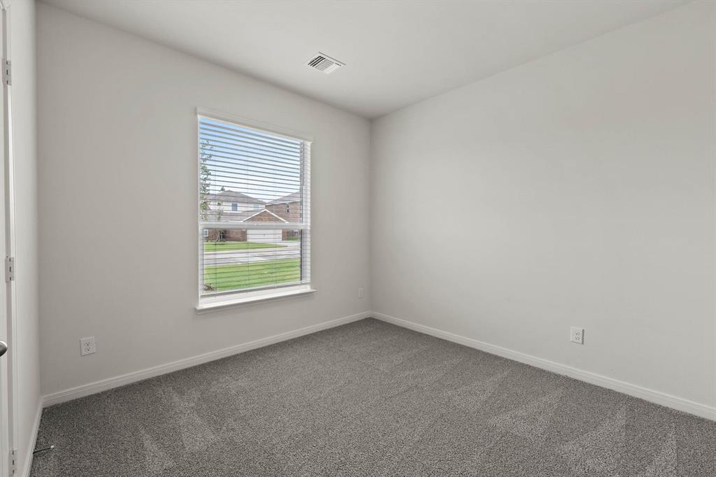 13409 Gitty Up Circle Cresson, TX 76035 - Photo 6 of 8 an empty room with a window