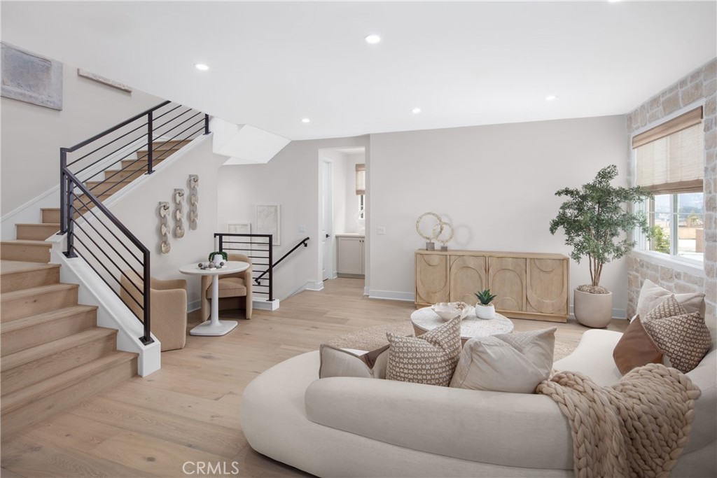 22060 Manarola Way Walnut, CA 91789 - Photo 11 of 20 a living room with furniture and stairs
