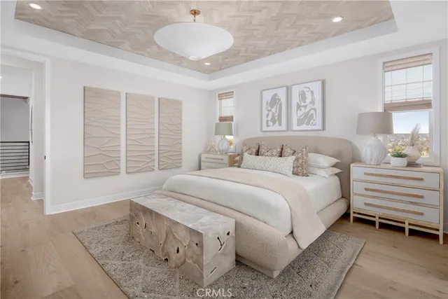 a spacious bedroom with a bed and a large window