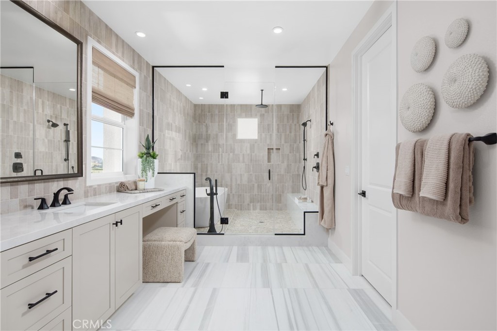 22060 Manarola Way Walnut, CA 91789 - Photo 14 of 20 a bathroom with a double vanity sink mirror and shower