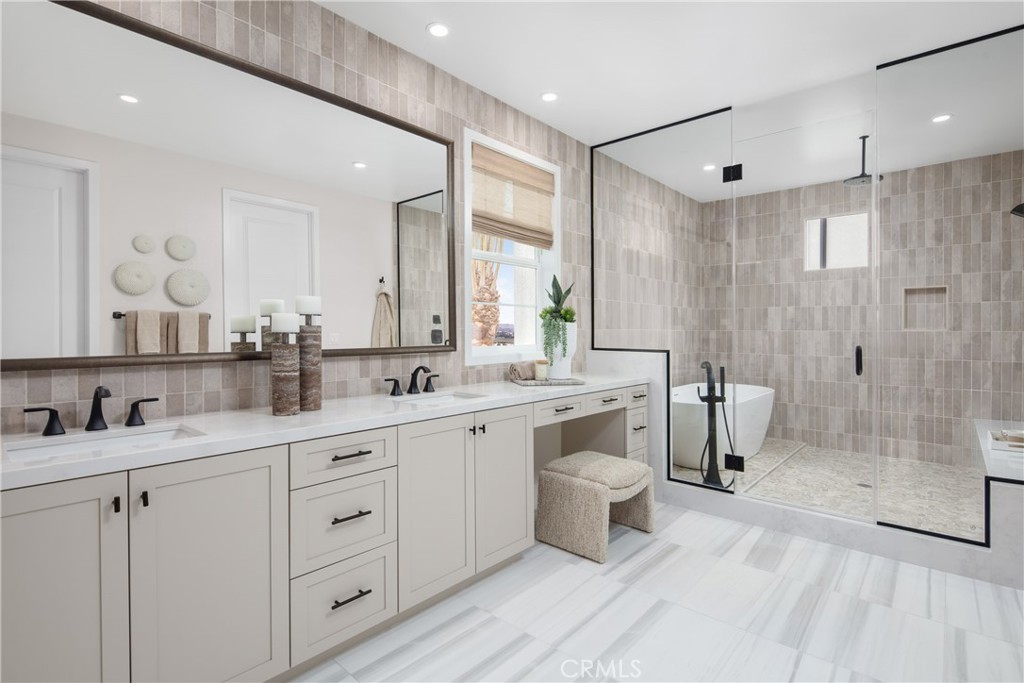 22060 Manarola Way Walnut, CA 91789 - Photo 15 of 20 a spacious bathroom with a double vanity sink a mirror and a shower