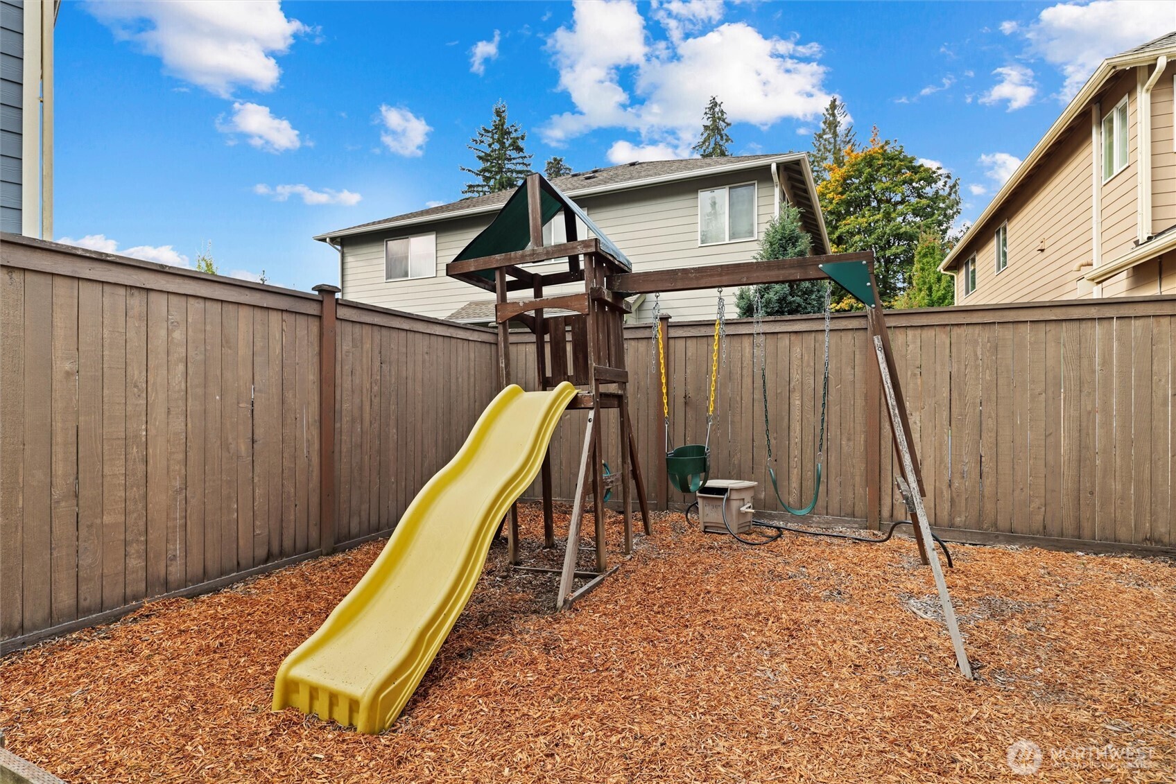 18927 10th Drive Southeast Bothell, WA 98012 - Photo 35 of 40 a view of a house with a backyard