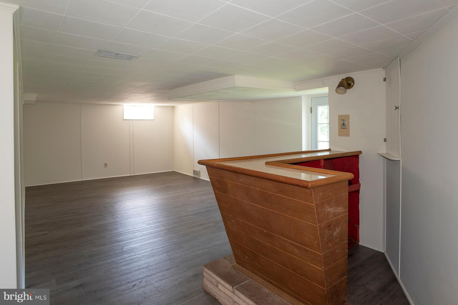 11828 Patrick Road Hagerstown, MD 21742 - Photo 24 of 29 Basement rec room with bar