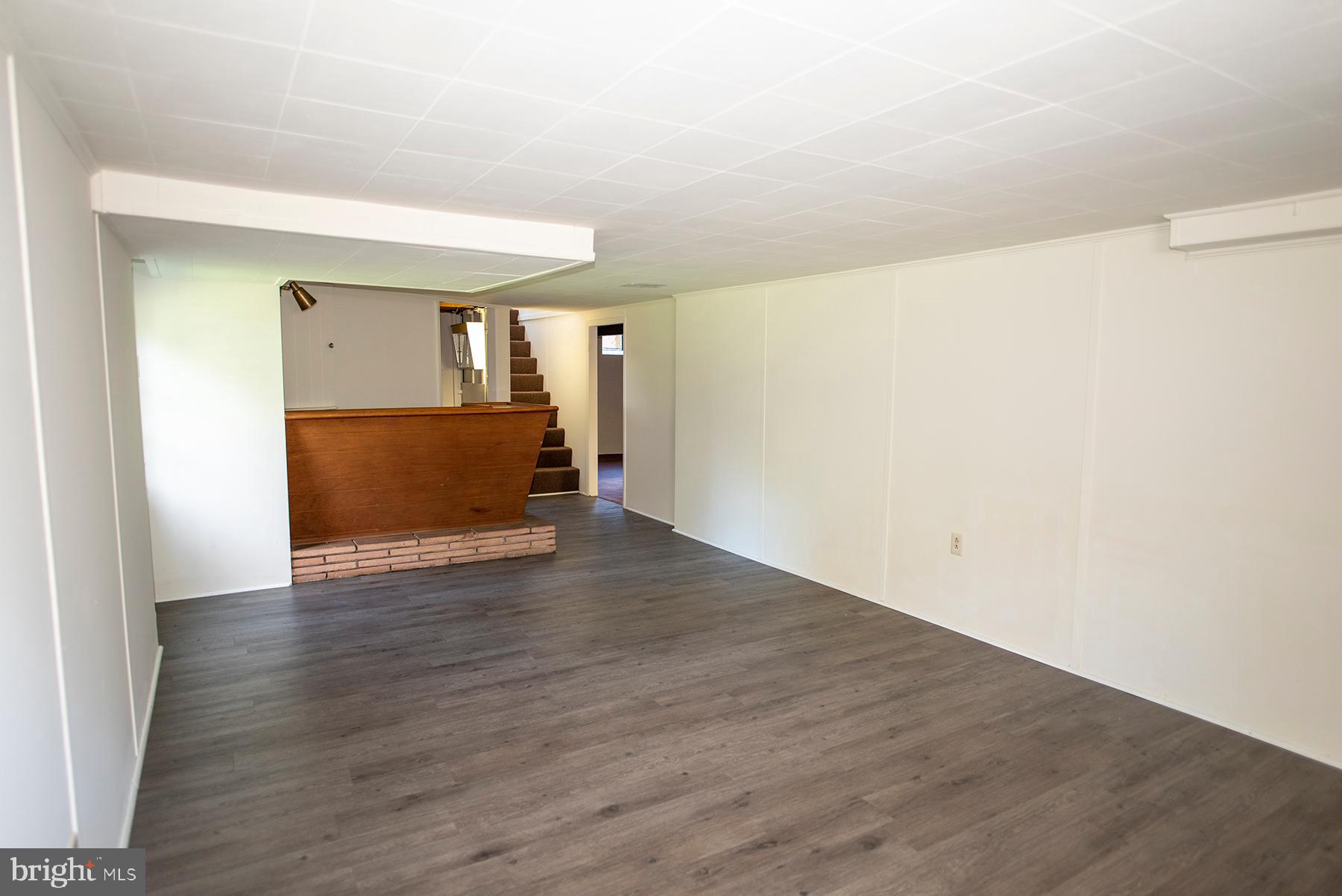 11828 Patrick Road Hagerstown, MD 21742 - Photo 25 of 29 Basement rec room with bar