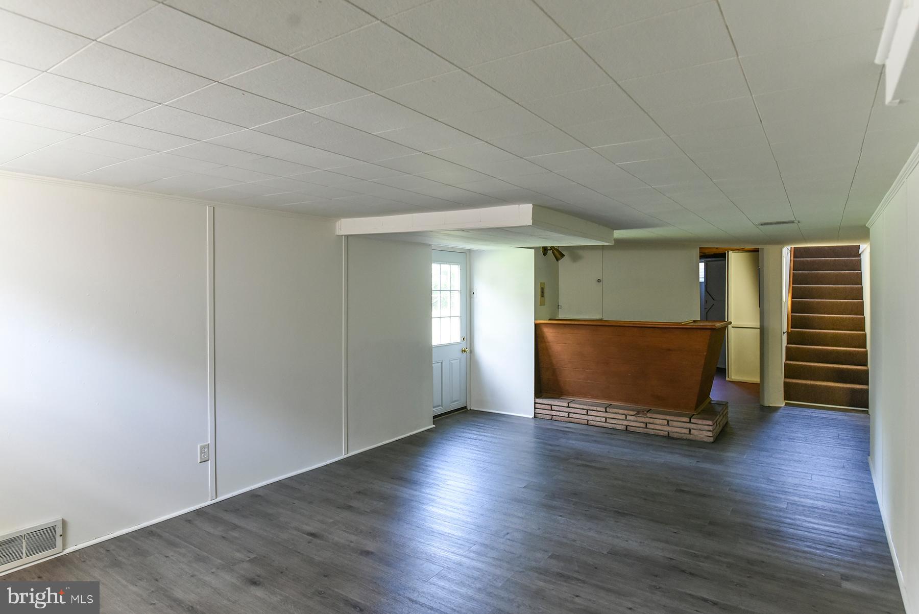 11828 Patrick Road Hagerstown, MD 21742 - Photo 26 of 29 Basement rec room with bar
