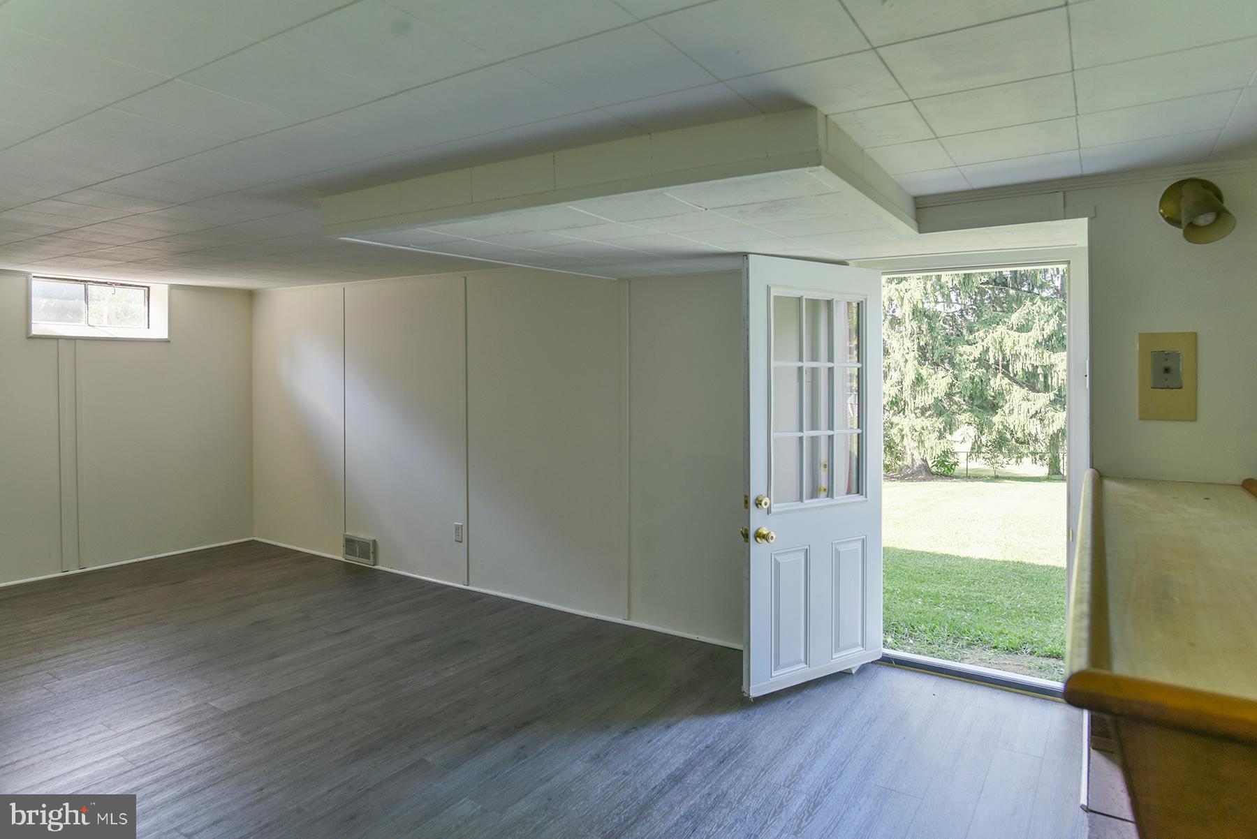 11828 Patrick Road Hagerstown, MD 21742 - Photo 27 of 29 Basement rec room with bar